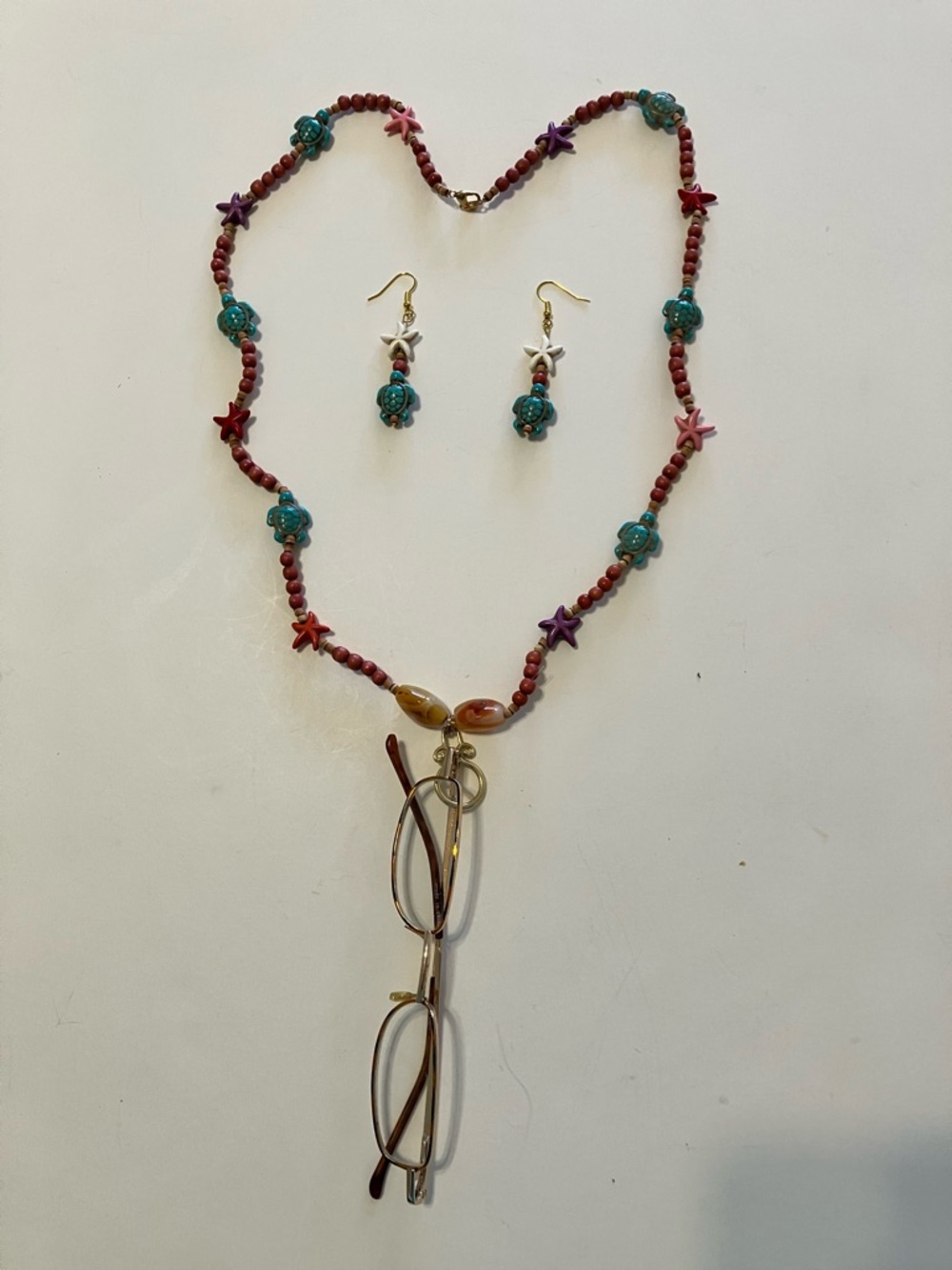 Super Fun Necklace and Earrings Used As A Eyeglass Holder
